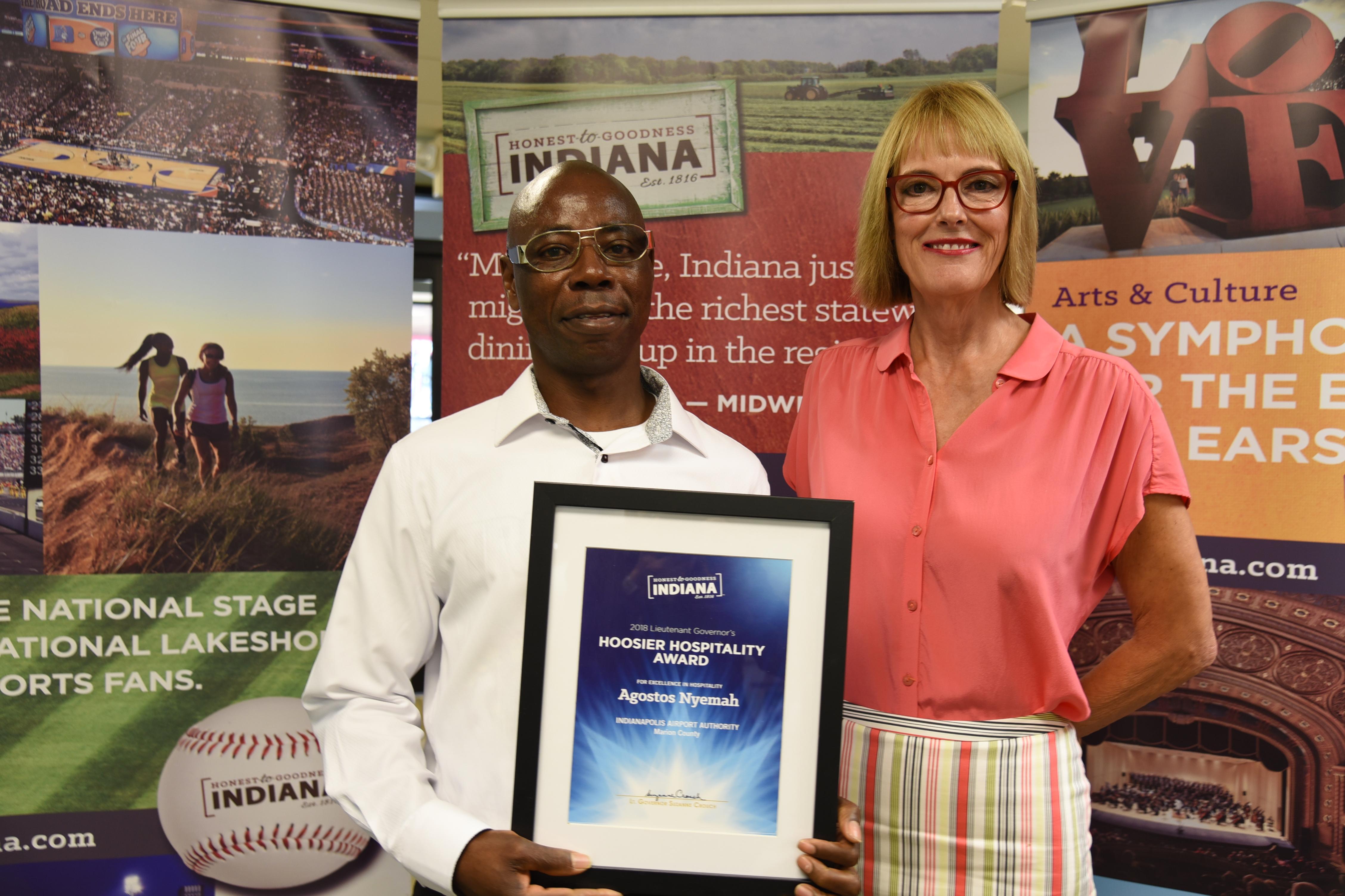 Agostos Nyemah (left), Lt. Governor Suzanne Crouch (right)